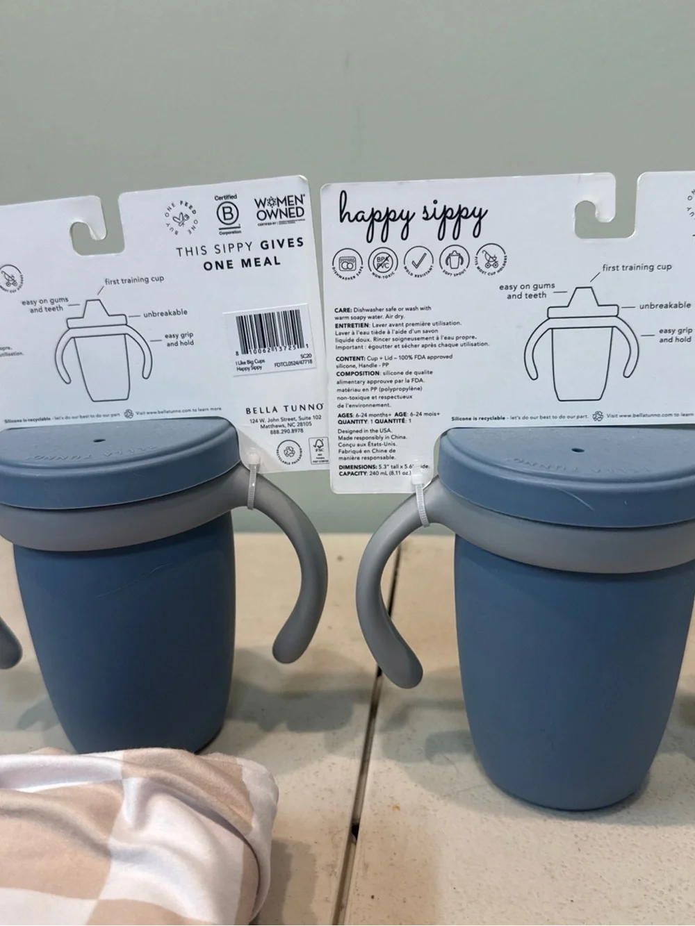bundle of baby items: 2x sippy cup, 1x car seat/feeding cover, 1x paci holder